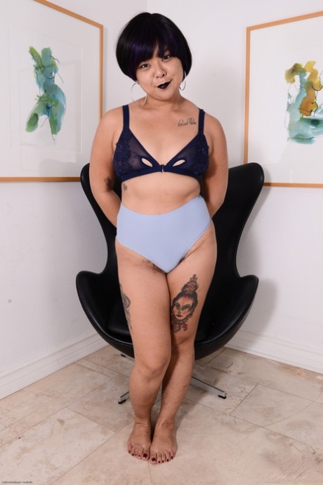 Curvy Asian Lulu Sparkle shows off her big ass & spreads her very hairy pussy