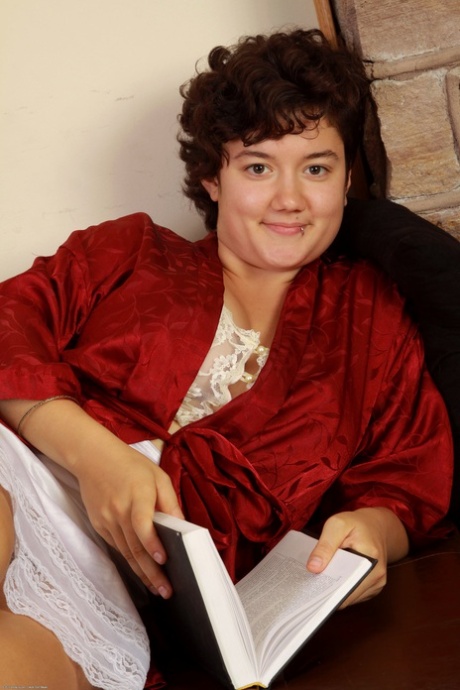 Curly-haired fatty Kimmy reveals her big tits and hairy pussy in a solo
