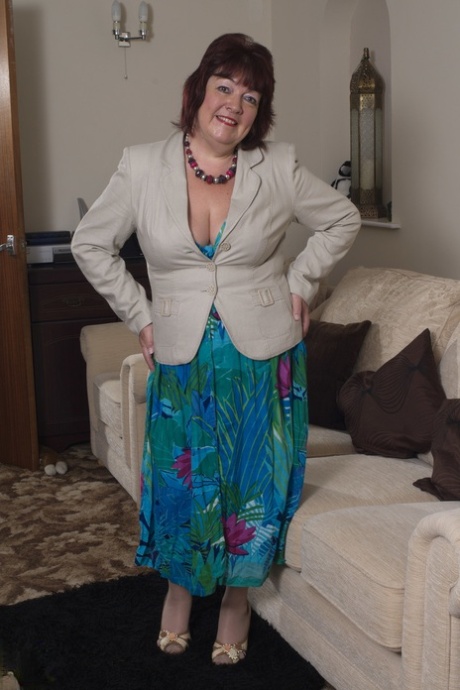 Mature housewife Helen teasing with her saggy tits & dildoing in lingerie