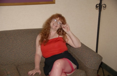 Curly-haired mature woman Sierra masturbates and gives a nice BJ