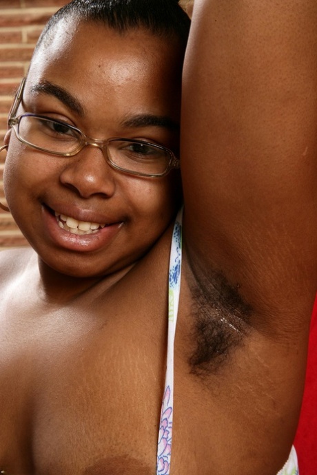 Chubby ebony with glasses Monica Jimenez strips & shows her hairy body