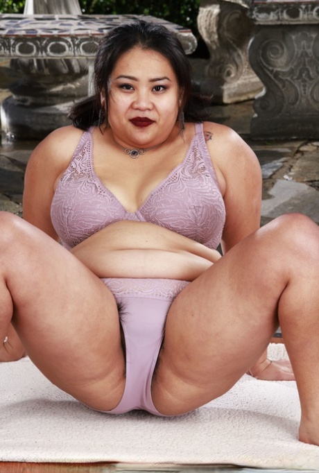 Chubby bombshell Manila Bey takes off her lingerie & shows off her hairy pussy