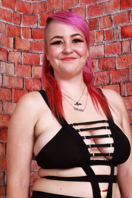 Pink-haired fatty Bratty Wolfie strips & shows her big tits & hairy holes