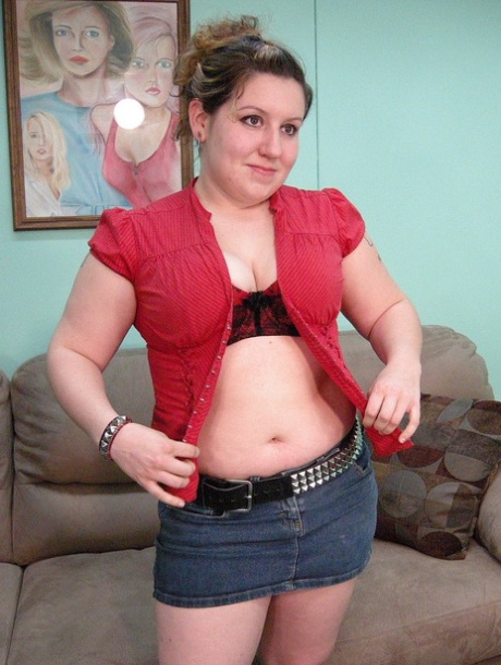 Sexy chubby babe Chloe strips completely naked in the living room