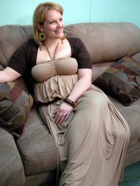 Blonde MILF Rebecca shows off her chubby naked body & spreads her pussy