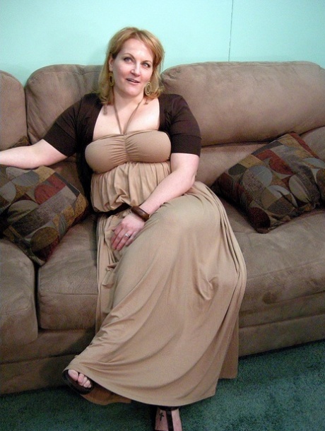 Blonde MILF Rebecca shows off her chubby naked body & spreads her pussy