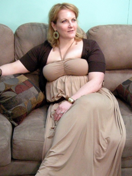 Blonde MILF Rebecca shows off her chubby naked body & spreads her pussy