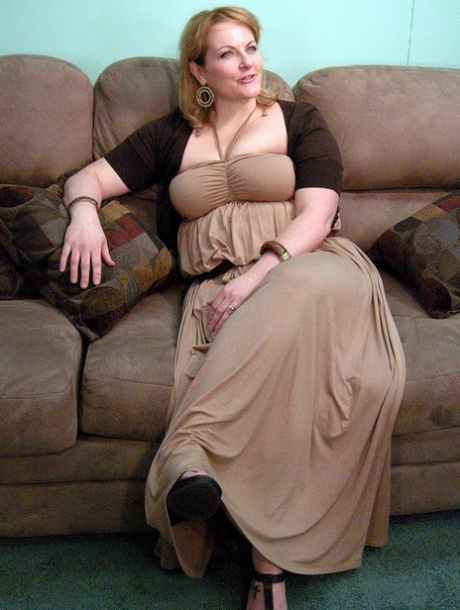 Blonde MILF Rebecca shows off her chubby naked body & spreads her pussy