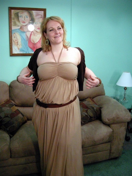 Blonde MILF Rebecca shows off her chubby naked body & spreads her pussy
