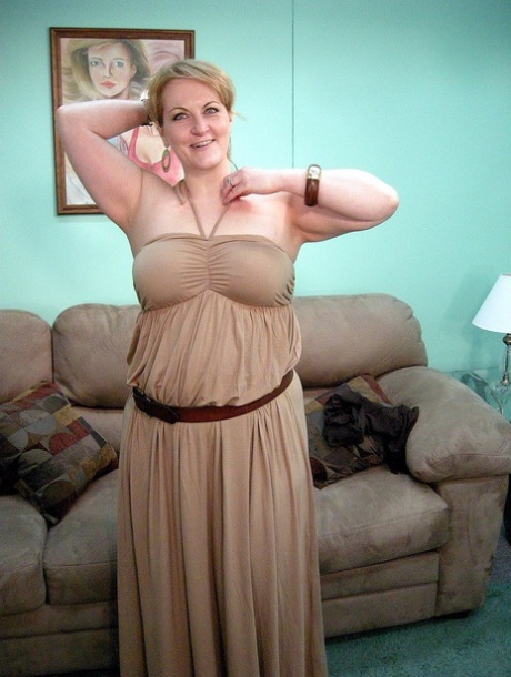 Blonde MILF Rebecca shows off her chubby naked body & spreads her pussy