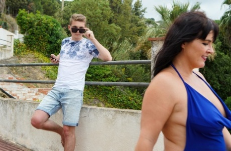 Mature goddess Montse Swinger enjoys wild outdoor sex with a young stud