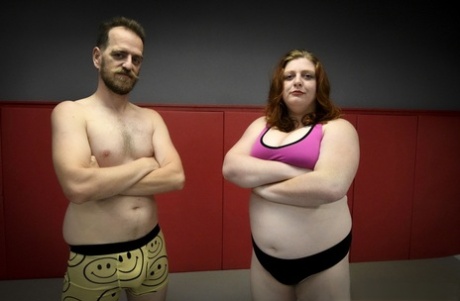 Chubby wrestler Betty Brickhouse dominates and pegs her sparring partner