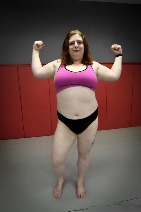 Chubby wrestler Betty Brickhouse dominates and pegs her sparring partner