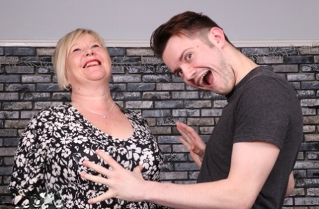 British granny Chantelle unleashes her boobs and teases a teen dick