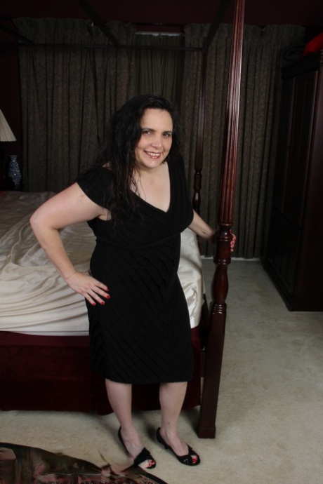 Fatty with natural tits Charly Fox loses her black dress & toys her juicy clam